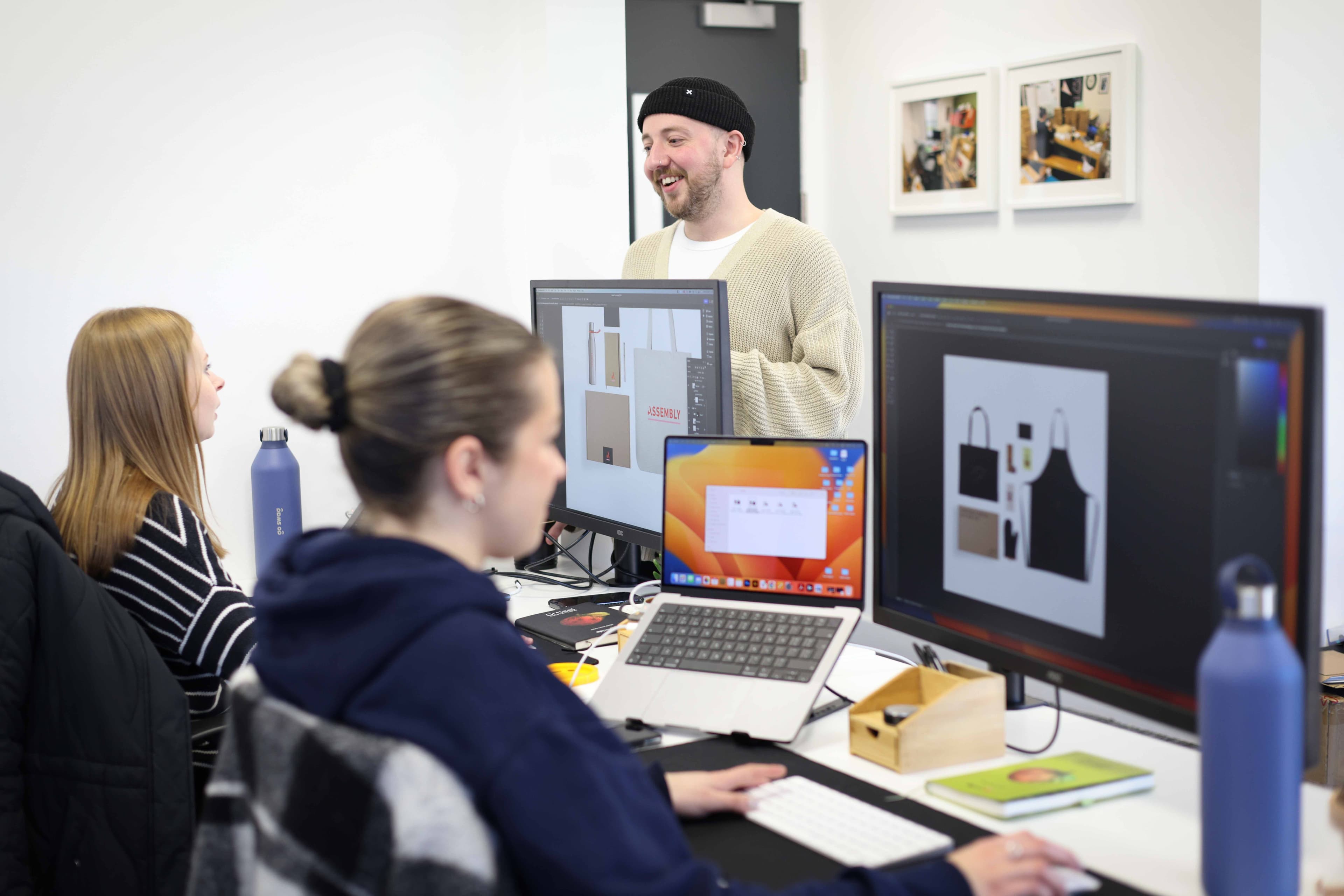 Photograph of a man in a busy office